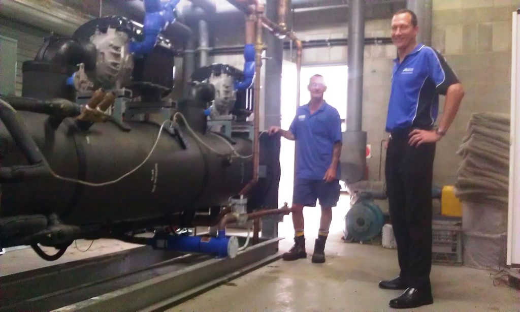 Brad Caton and Adam Thompson are both pleased with South Tweed Sports' dramatic reduction of its air-conditioning costs.